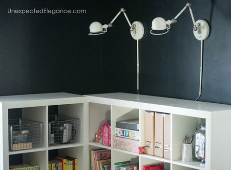 Do you have a corner of a room that needs some storage? Check out this EASY corner cabinet IKEA hack, to turn inexpensive shelving into a corner storage unit. Corner Kallax Ideas, Corner Kallax Hack, Corner Cube Shelves, Ikea Corner Storage Hack, Corner Tv Unit Hack, Ikea Corner Tv Unit Ideas, Ikea Kallax Corner Hack, Corner Cube Storage Ideas, Ikea Corner Cabinet Hack