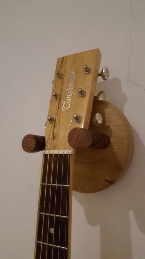 How to Build Your Guitar Hanger: Top 5 Things You Should Know Musician Decor, Guitar Wall Holder, Guitar Chair, Build Your Own Guitar, Guitar Hook, Guitar Holder, Guitar Wall Hanger, Making Musical Instruments, Guitar Display