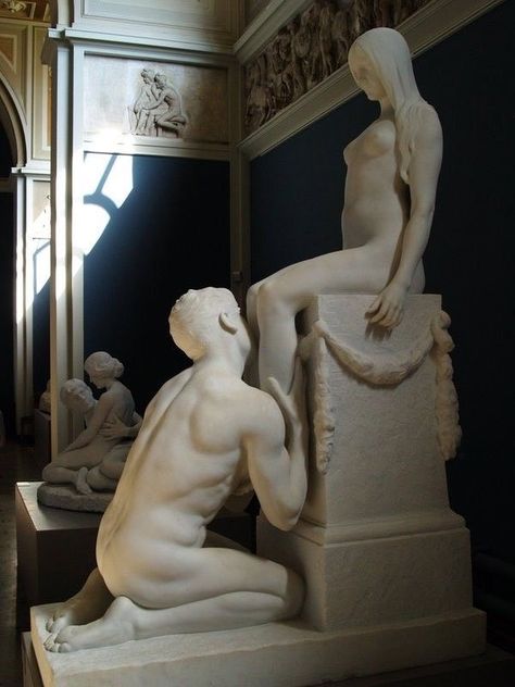 Couple Statue Aesthetic, Man Bowing To Woman Statue, Lovers Statue Art Sculptures, Man Kissing Woman Leg Statue, Greek Statue Couple, Dark Statue Aesthetic, Man On Knees, Eros Aesthetic, Kissing Statue