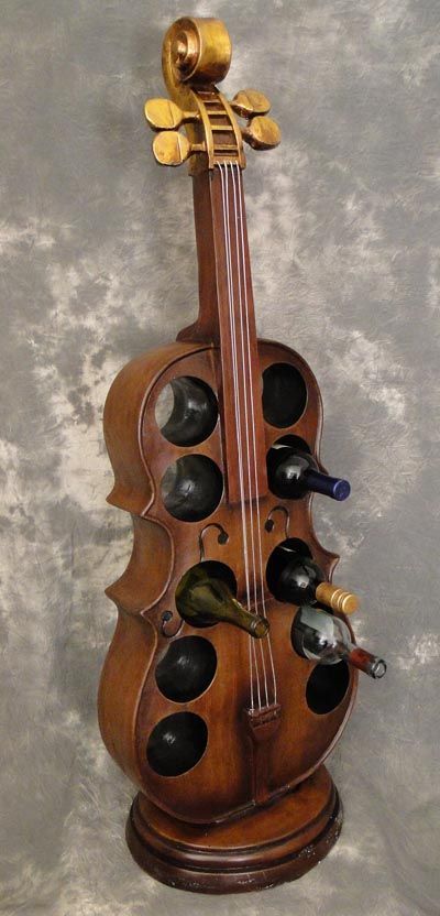 Cello wine rack  A Truly Instrumental Furniture Accessory that Functions as a Place to Hold 10 Wine Bottles - Resin and Wood Reproduction of an Actual Size Cello Musical Instrument Stands on Base - Bottles Shown But Not Included.Size: 47" High Music Furniture, Homemade Instruments, Instruments Art, Musical Art, Music Decor, Bottle Holder, Musical Instrument, Diy Arts And Crafts, Furniture Accessories