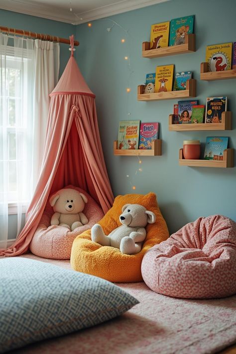 Transform your kids' room into a storybook paradise! 🌟✨ This cozy reading nook features plush bean bags, a dreamy canopy, and floating shelves to display their favorite books. Perfect for inspiring little imaginations and creating a love for reading! #KidsRoomDecor #CozyNooks #ReadingCorner Reading Nook Toddler Room, Kids Library Corner, Kids Book Corner, Kids Room Reading Corner, Preschool Reading Corner, Playroom Reading Corner, Reading Nook For Kids, Kids Reading Corner, Reading Corner Classroom