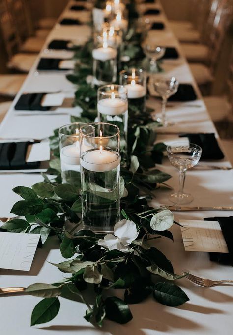 Dark Flowers Wedding Table Settings, Black Square Candle Holder Wedding, Long Greenery Centerpiece, Dark Themed Wedding Centerpieces, Wedding Table Long Candles, Long Wedding Tables With Greenery, Green And Black Wedding Table Decor, Wedding With Rectangle Tables, Candle Centerpiece Wedding Long Table