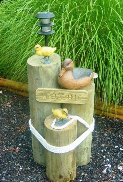 Nautical pilings with rope arranged to hide a well pipe Nautical Pilings, Nautical Landscaping, Duck And Ducklings, Lawn Decorations, Nautical Diy, Coastal Beach Decor, Decorative Ideas, Lawn Ornaments, Yard Project