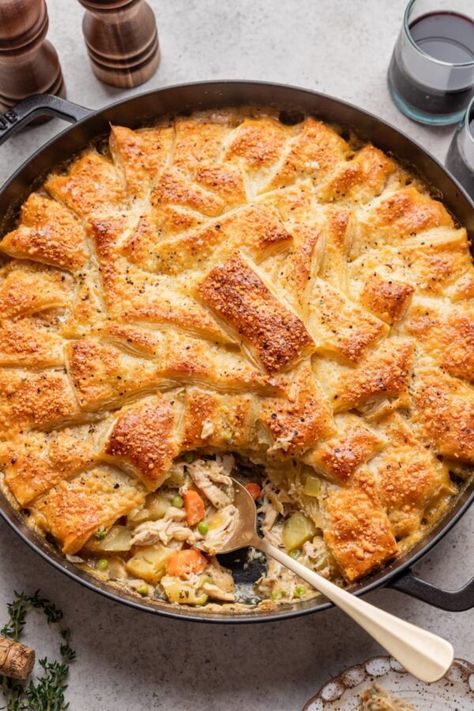 Slice removed from golden brown chicken pot pie in puff pastry. Pot Pie With Puff Pastry, Pie With Puff Pastry, Puff Pastry Chicken, Carrots And Celery, Savoury Pies, Homemade Chicken Pot Pie, Puff Pastry Crust, Rosemary And Thyme, Easy Chicken Pot Pie