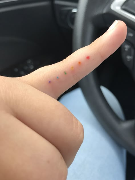 Color spectrum dot tattoo Colorful Dots Tattoo, Colored Dots Tattoo, Rainbow Dot Tattoo, Marvel Tiny Tattoo, Rainbow Dots Tattoo, Color Swatch Tattoo, Tiny Color Tattoos, Tiny Marvel Tattoos, Cute Marvel Tattoos