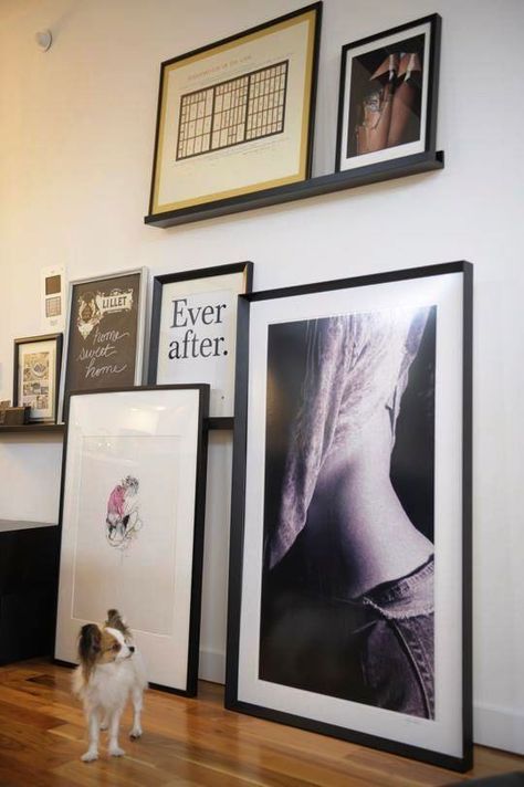 Leaning pictures or mirrors on the floor is one way to display large pieces. Another benefit are no holes in the wall! Big Art, Inspiration Wall, Pictures To Paint, Little Dogs, Art Display, Large Art, Interior Inspiration, A Dog, The Wall