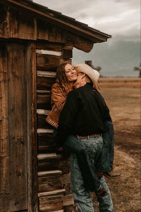 Photoshoot | Jackson Hole | Wyoming | Mormon Barn | Mormon Row Barn | Grand Teton National Forest | Rainy Photoshoot | Wrangler | Ariat | Fall Photoshoot | Western Photos | Western Outfit | Turquoise | Cowgirl boots | Wyoming Photoshoot, Western Couples, Cute Country Couples, Western Photoshoot, Couple Engagement Pictures, Country Couples, Country Engagement, Couple Picture, Jackson Hole Wyoming