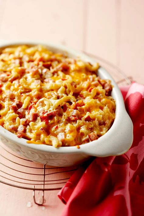 Preheat your oven, stir together the ingredients, bake. That's all it takes to make this quick and easy dump and bake casserole. #dumprecipes #dumpdinners #dumpandbakecasserole #easymeals #weeknightdinner #bhg Dump Casseroles, Quick Casserole Recipes, Quick Casseroles, Ham Casserole, Bacon Mac And Cheese, Dump Meals, Cheesy Casserole, Vegetable Casserole, Baked Casserole