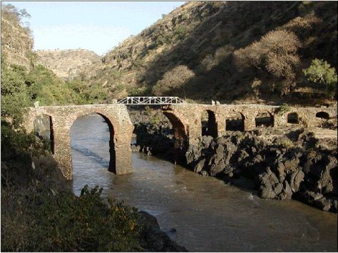 "Broken Bridge" over  the Blue Nile River Crossing The Rubicon, Broken Bridge, History Of Ethiopia, Stone Bridges, Old Bridges, Ancient Village, Ancient Kingdom, Stone Bridge, Nile River