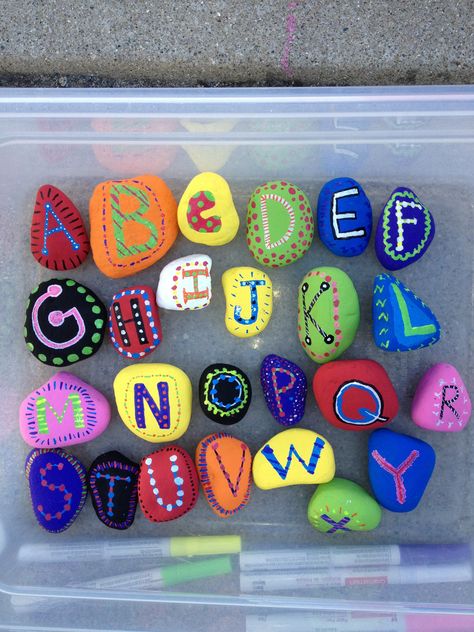 Alphabet rocks! Young kiddos painted them, then uppercase letters on one side with lowercase on the other side:) used paint markers to write letters Rock Painting Ideas Letters, Painted Earth, Preschool Projects, Fruity Pebbles, Painted Rocks Kids, Rock Painting Ideas Easy, Painted Rocks Diy, Painted Letters, Paint Markers