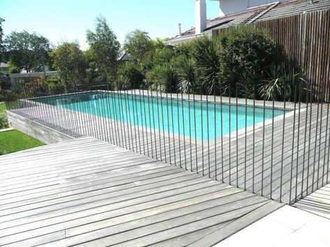 Who doesnt adore to swim? Sitting by the water, lounged back, in the manner of a drink in hand; its even bigger later you can complete that in your own pool fence backyard. If you are looking to host often more or less your pool, it can be important to create the heavens as delightful and dynamic for social functions. #privacyfencedesigns Pool Fencing Landscaping, Living Pool, Fence Plants, Brick Fence, Pool Landscape Design, Front Yard Fence, Farm Fence, Fence Lighting, Pool Fence