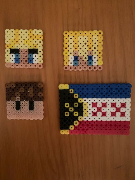 All items made from Perler beads. 1. Tommyinnit Minecraft head. Square head with blonde hair, blue eyes, black eyebrows. 2. Tubbo Minecraft head. Square head with blonde hair, long bangs, blue eyes. 3. Wilbur Soot Minecraft head. Square head with brown hair, black eyes. 4. L’manberg flag. Rectangular flag. Blue, white, and red horizontal stripes. 2 red Xs in the white stripe. To the left, a black half circle with a yellow X in the middle and yellow outline. Lmanburg Flag Perler Beads, Lmanburg Flag Pixel Art, Wilbur Soot Perler Beads, Mcyt Perler Bead, Dsmp Perler Bead Patterns, Dsmp Perler Beads, Minecraft Perler Bead Patterns, Minecraft Beads, Hamma Beads Ideas