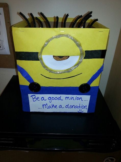 Minion donation box                                                                                                                                                                                 More Donation Boxes Ideas, Food Drive Box Decoration Ideas, Donation Box Decoration Ideas, Book Donation Box Ideas, Food Drive Boxes Ideas, Book Drive Box Ideas, Can Food Drive Box Ideas, Fall Food Drive Box Ideas, Candy Donation Box Ideas Halloween