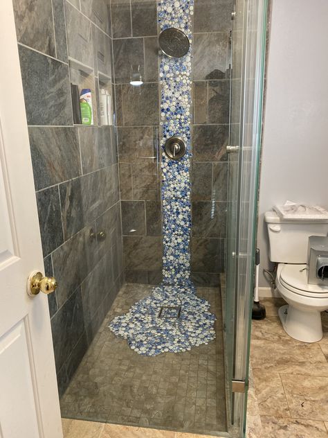 Blue Pebble Shower Floor, Waterfall Tile Shower Design, Mosaic Waterfall, Waterfall Mosaic, Room Asthetics, Shower Redo, Florida Bathroom, Pebble Shower Floor, Mosaic Shower Tile