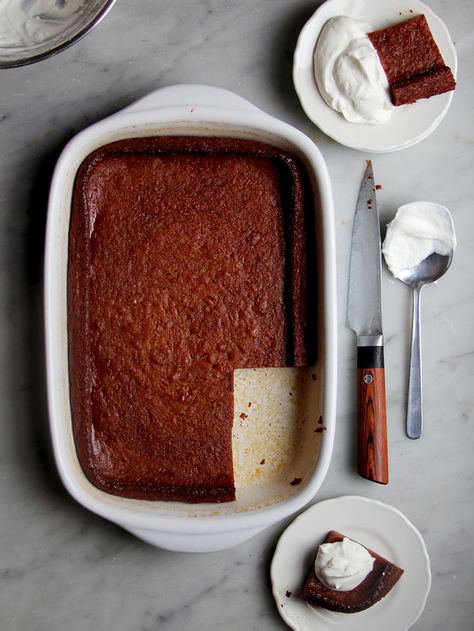 Persimmon Pudding: Persimmons, one of our favorite cool-weather fruits, form the base for this delicate pudding with a crispy, cake-like crust. Persimmon Pudding, Persimmon Recipes, American Desserts, Pudding Desserts, Desserts To Make, Pudding Recipes, Bread Pudding, Fall Desserts, Eat Dessert