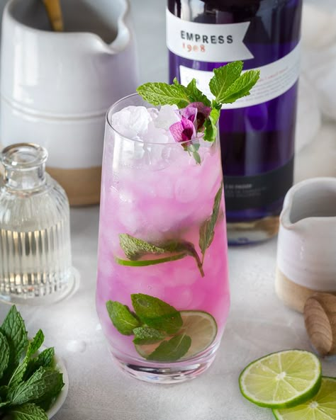 This delicious take on the classic mojito features gin (not rum) mixed with freshly-squeezed lime juice, fresh muddled mint, a bit of simple syrup, and a splash of soda water. It has a crisp, citrusy, minty, slightly fizzy taste. And it's the perfect cocktail for warmer weather! #gin #ginmojito #gincocktails #empressgin #southsidefizz #ginrickey #londonmojito #pinkdrinks Empress Gin And Tonic Recipe, Drinks With Empress Gin, Empress Gin Cocktail Recipe, Gin Mojito Recipe, Empress Gin Cocktail, Gin Mojito, Empress Gin, Empress 1908 Gin, Gimlet Cocktail