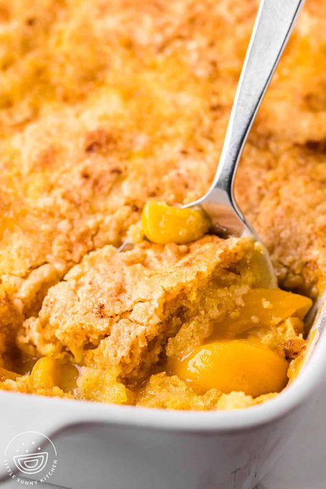 Peach Dump Cake is a quick and easy shortcut dessert recipe made with just 5 ingredients, including a boxed cake mix and a can of peaches. Apricot Dump Cake, Cake Mix Peach Cobbler, Peach Desserts Easy, Good Peach Cobbler Recipe, Cake Mix Cobbler, Pineapple Dump Cake, Pumpkin Dump Cake Recipe, Peach Cobbler Dump Cake, Easy Dump Cake Recipe