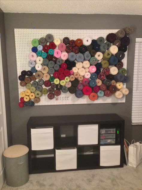 Yarn wall!  Yarn storage on a pegboard :) Yarn Storage Ideas, Yarn Organizer, Yarn Projects Crochet, Knitting Room, Office Organizing, Shop Image, Craft Supply Storage, Ribbon Storage, Yarn Organization