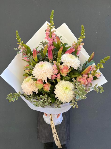 Bouquet pink and white. Brisbane florist. Open 7 days a week. Tulip And Snapdragon Bouquet, Snap Dragon Floral Arrangement, Wedding Anniversary Bouquet, Snapdragon Bouquet, Bouquet Pink And White, Market Bouquets, Snapdragon Flowers, Luxury Bouquet, September Flowers