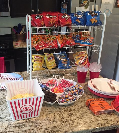 Baseball birthday party. Concession stand. Chip display using shoe rack. Birthday Party Chip Display, Snacks Display Ideas, Chip Holder For Party, Snack Stand Ideas, Chips Display For Party, Chip Display For Party, Concession Stand Party Ideas, Concession Stand Organization, Snacks Station