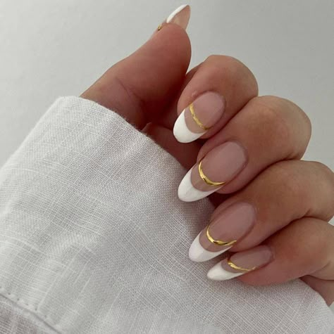 40 Totally Fabulous Two-Tone French Nail Ideas Classic Nails With A Twist, Short French Manicure With A Twist, French Manicure With Gold Line, Two Tone French Nails, French Tip With Gold Design, Elegant Nails Gold, White And Gold French Tip Nails, Double Line French Tip Nails, Modern French Tip Nails