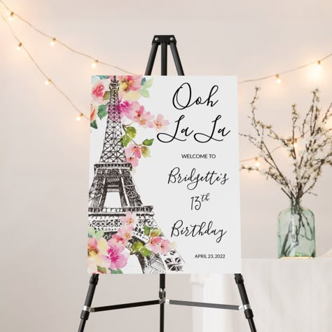 Start your Parisian event off with some french flare with this floral Paris themed welcome sign. Complete with a sketch of the Eiffel tower, guests are sure to say "ooh la la" as soon as they see it. Paris Themed Birthday Party For Adults, Paris Party Decorations Diy, Parisian Themed Party Decor, Paris Themed 1st Birthday Party, Paris Themed Party Ideas, Paris Themed Birthday Party Decoration, Paris Decorations Party, Paris Centerpiece Ideas, French Themed Party Decorations