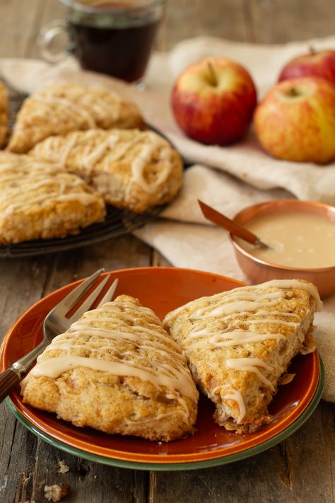 Two scones on a rust colored plate with a rack of scones behind. Pecan Scones Recipe, Toffee Scones, Easy Scone, Pecan Scones, Cranberry Scones, Scones Recipe Easy, Cozy Afternoon, Scones Easy, Savoury Biscuits