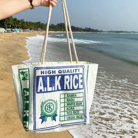 The perfect holiday tote bag, made from upcycled rice sacks. Extremely lightweight, waterproof and durable, they are great for the beach, with rope handles and a zipped inner pocket for valuables. Handmade by women in rural areas of Sri Lanka, they are sustainable, practical, colourful and fun! #handmadeinsrilanka #totebag #beachbag #festivalbag #upcycledbags #ricesack #ricesackbag #recycledricesack Vintage Sri Lanka, Malinga Sri Lanka, Sri Lanka Beaches, Paradise Road Sri Lanka, Holiday Tote Bag, Sri Lanka Sigiriya, Sack Bag, Festival Bag, Rural Area