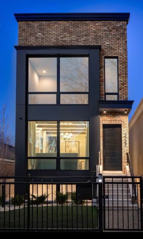 The doors, window and gate are all rectangular adding harmony in their likeness Modern Brick House, Townhouse Exterior, Modern Townhouse, Townhouse Designs, Narrow House, Architecture Design Concept, Row House, Industrial House, City House