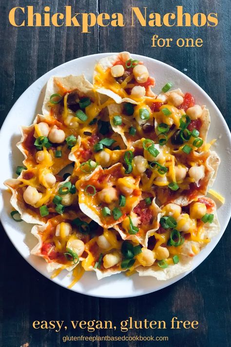 Easy Chickpea Nachos for One – Vegan and Gluten FreeIngredients1 oz gluten free tortilla chips1/3 cup salsa (or to taste)1/3 cup cooked or canned chickpeas (or to taste)1/4 cup non-dairy shredded cheese (or to taste)DirectionsPlace chips in a single layer on a microwave safe plate.Spoon salsa evenly onto chips.Spoon chickpeas evenly onto chips.Sprinkle evenly with non-dairy shredded cheese.Microwave on high for 1 minute or until cheese is melted. PrintEasy Chickpea Nachos for One – Chickpea Nachos, Gluten Free Salsa, Gluten Free Corn Tortillas, Gluten Free Tortilla Chips, Multigrain Chips, Tostitos Scoops, Non Dairy Cheese, Vegan Nachos Cheese, Tortilla Chip Recipe