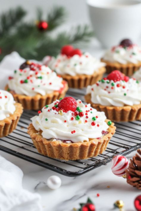 Christmas Dessert Tarts Recipe: Mini Treats Full of Holiday Cheer! - The Fresh Man cook Tart With Fruit, Christmas Mini Tarts Desserts, Mini Holiday Pies, Christmas Tarts Recipes, Holiday Tarts Christmas Desserts, Christmas Mini Tart Recipes, Mini Tart Filling Recipes, Christmas Tarts Desserts, Easy Tarts Desserts