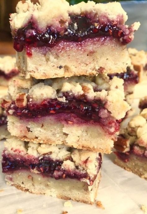 Buttery pecan shortbread layered with raspberry jam. #easydessert Raspberry Shortbread Bars, Raspberry Shortbread, Oat Crumble Topping, Blueberry Crumble Bars, Pecan Shortbread, Blueberry Filling, Raspberry Bars, Crumb Bars, Shortbread Bars