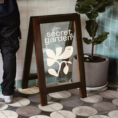 Secret Garden, a botanical discovery where you’ll learn all about plants. 🌱 The visual identity gracefully captures the wonders of nature,… | Instagram Nature Logo Design, Garden Posts, Shop Illustration, Green Box, Garden Cafe, Natural Logo, Plant Illustration, Event Poster, Logo Design Trends