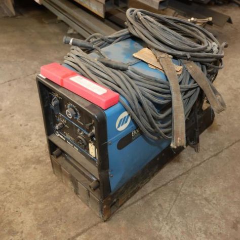 Miller Bobcat 225G Plus welder/generator with Kohler Command CH18 engine, 8.5KW, single phase, hours reading 480. Excludes wire rolls. Tanks are rented, not owned and are not included in this lot. Seller reports in working condition. Welder Generator, Tools And Equipment, Garden Tools, Rolls, Auction, Tools, Reading, Wood