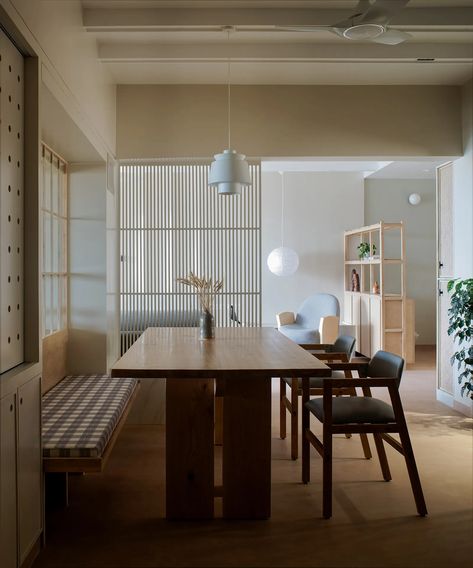 Step into a warm, minimalist Pune home that embodies the Shibui design aesthetic | Architectural Digest India Shibui Aesthetic, Monochrome Apartment, Wabi Sabi Design, Built In Sofa, Wabi Sabi Decor, Monochrome Color Palette, Louver Windows, Minimalist Japanese, Indian Homes