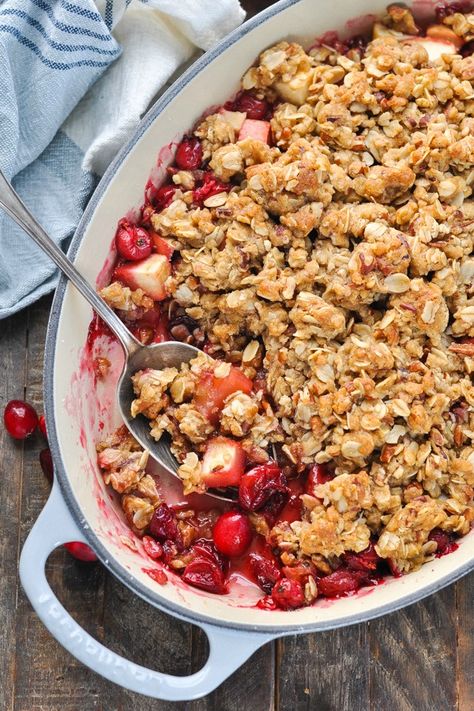 This Old Fashioned Cranberry Apple Crisp is the perfect easy dessert recipe for Thanksgiving, Christmas or any other special gathering this season! The sweet and tart fruit is topped with a buttery oat crumble for the ultimate decadent treat -- with just 10 minutes of prep! Apple Recipes Easy | Apple Recipes Dessert | Thanksgiving Dessert Ideas | Christmas Ideas Cranberry Apple Crisp With Oatmeal, Apple Cranberry Crisp Recipe With Oats, Cranberry Crisp Recipes, Cranberry Apple Casserole, Cranberry Apple Dessert Recipes, Cranapple Crisp, Apple Rhubarb Crisp, Apple Recipes Dessert, Apple Cranberry Crisp Recipe