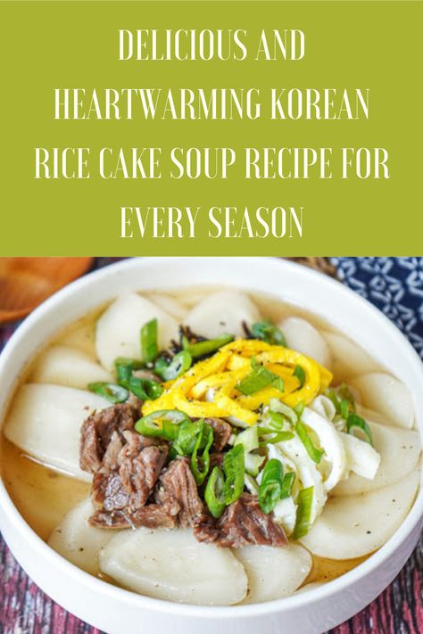 Image of a bowl of homemade Korean rice cake soup, also known as Tteokguk, filled with sliced rice cakes, tender beef slices, and garnished with chopped green onions and sesame seeds. The soup is steaming hot and served in a rustic bowl, showcasing its comforting and hearty appearance. Rice Cake Soup Korean, Korean Rice Cake Soup, Rice Cake Soup, Pork Stock, Korean Soup, Bowl Of Rice, Korean Rice Cake, Einkorn Flour, Korean Side Dishes