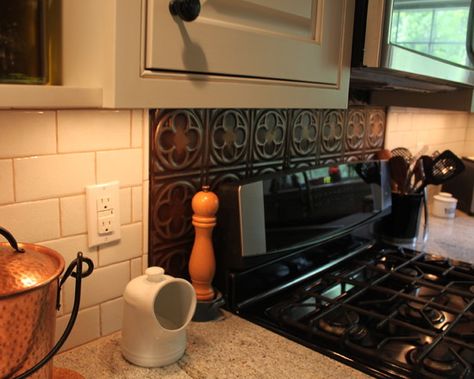 Tin Backsplash just behind the stove Tin Tile Backsplash, Kitchen Design Remodel, Tin Backsplash Kitchen, Backsplash Behind Stove, Farmhouse Faucet, Modern Kitchen Inspiration, Backsplash Tile Design, Brick Backsplash Kitchen, Stove Ideas