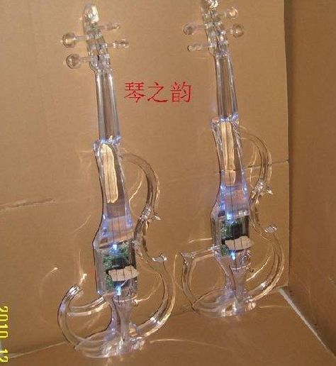 glass violin Clear Violin, Glass Violin, Painted Pianos, Violin Players, Cellos, Cosplay Props, Violin, Musical Instruments, Landscape Design