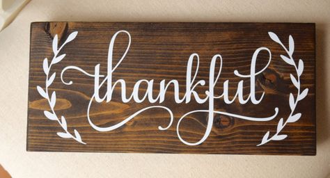 Wooden Sign with Handwritten "Thankful" in White Paint Thankful Sign, Thanksgiving Sign, Thanksgiving Signs, Halloween Tattoo, Fall Sign, Pallet Signs, Rustic Wood Signs, Craft Night, Fall Signs