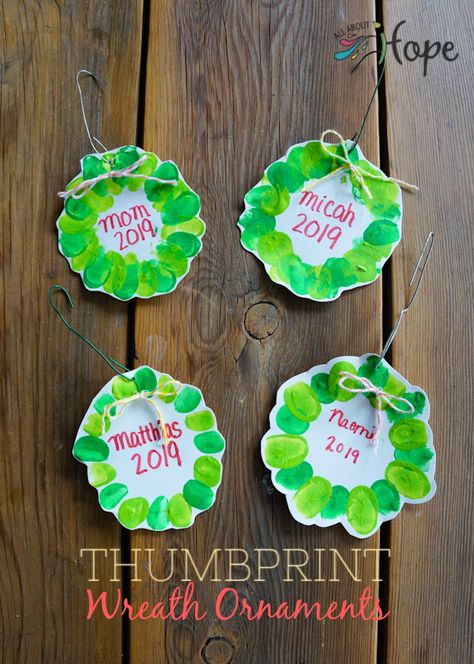 Kids Ornament Craft Hand Prints, Wood Ornaments Diy Tree Slices Kids Fingerprint, Handprint Wreath Craft, Finger Print Wreath, Fingerprint Wreath Ornament, Thumbprint Ornaments Diy, Christmas Fingerprint Ornaments, Fingerprint Ornaments Christmas, Thumbprint Christmas Art