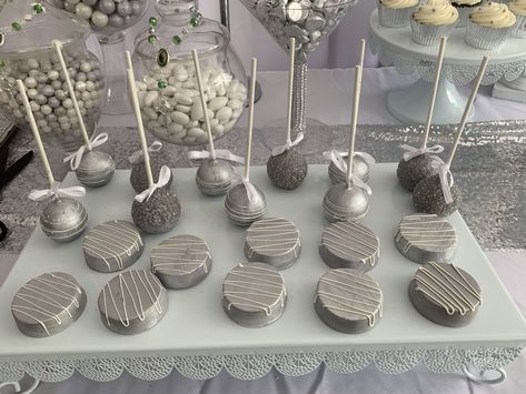 Chocolate covered Oreos and cake pops Black And Silver Treat Table, Grey Foods For Party, Disco Theme Desserts, Metallic Cake Birthday, Black And Silver Treats, Disco Treats, Silver Desserts, Silver Dessert Table, Silver Cake Pops