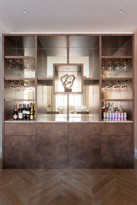 We build beautiful, luxury and distinctive home bars - each as unique as the property they are destined to live in. Bar With Mirror Behind It, Smoked Mirror Bar, Mirrored Bar Wall, Antique Mirror Bar, Mirror Backsplash Bar, Butlers Bar, Bar In Home, Living Room Joinery, Garden Room Bar