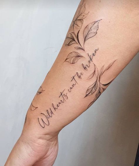 Vines Around Quote Tattoo, Vine Tattoo With Quote, Cute Wrap Around Arm Tattoos, Wrap Around Arm Tattoo For Women Quotes, Vines Around Words Tattoo, Words With Vines Tattoo, Script And Floral Tattoo, Quote Wrapped Around Arm Tattoo, Floral And Script Tattoo