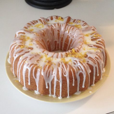 When I was a child, I remember my Mom making this cake. I don't think she ever wrote down the recipe but this is my version of her "Lemon Tunnel Cake". It is requested a lot by friends and family or when I am baking for any gathering. It's a lemon-lover's dream... Tunnel Cake, Dessert Places, Bundt Cake Recipe, Italian Breakfast, Lemon Bundt Cake, Bundt Cake Pan, House Cake, Lemon Pudding, Bundt Cakes Recipes