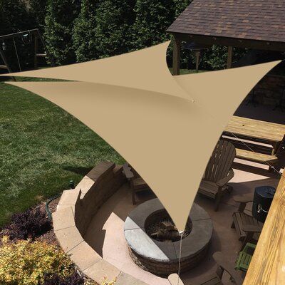 These Shade Sails protect and shade your outdoor areas. Also known as Sail Shades, these unique coverings make beautiful additions to your patio, backyard, or other outdoor areas, and they provide excellent protection from the sun and its harmful UV radiation. Color: Sand | yeahmart Waterproof 9.8' Triangle Shade Sails in Brown, Size 118.0 W x 118.0 D in | Wayfair Garden Sail, Triangle Shade Sail, Triangle Sun Shade, Sun Shade Canopy, Sail Canopies, Backyard Shade, Sun Shade Sail, Sun Shelter, Waterproof Tent