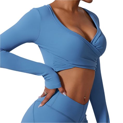 Elevate your workout wardrobe with our premium Sports Long-Sleeved Crop Top. Designed for the modern woman, this gym top features a quick-dry fabric for ultimate comfort during intense workouts. Show off your fashion-forward style with this versatile piece that effortlessly transitions from the gym to brunch.