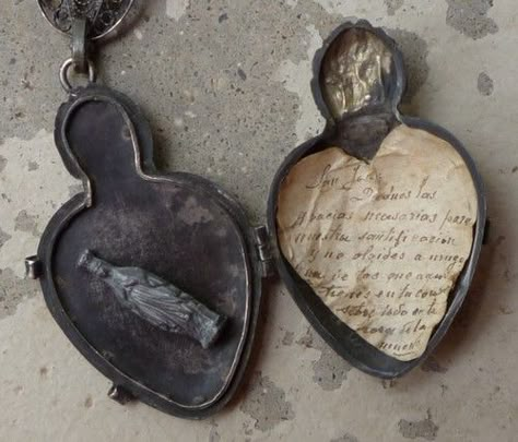 glitch-angel:ex voto locket containing a miniature relic of... Devils Advocate, Blurry Aesthetic, Italian Coast, Southern Gothic, Playlist Covers, Religious Icons, Sirius Black, Heart Locket, On The Ground