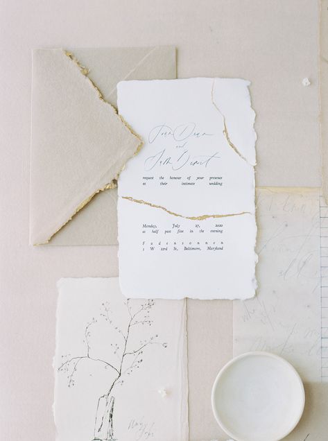 An organic style calligraphy on handmade paper by Eliv Rosenkranz and designed and photographed by Nikki Daskalakis. Styled by East Made Co. Gold paint was added (and inspired by wabi-sabi styles) to the edges of the handmade paper where it was torn, a nod to finding beauty at the imperfect places. Wabi Sabi Wedding Inspiration, Moody Wabi Sabi, Wabi Sabi Wedding, Portrait Editorial, 2025 Wedding, Wabi Sabi Style, Luxury Destination Wedding, Organic Style, Japanese Aesthetic