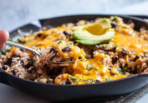 This easy cheesy rice and beans is all made in a single skillet! It has great flavors and can be served as a side dish or as an entree served with flour tortillas. YUM! macheesmo.com #cheese #easyrecipes #riceandbeans #mexican #texmex Rice And Beans Meal, Easy Cheesy Rice, Rice And Beans Recipe, Cheesy Rice, Beans Beans, Easy Rice, Mild Salsa, Rice And Beans, Recipe Vegetarian